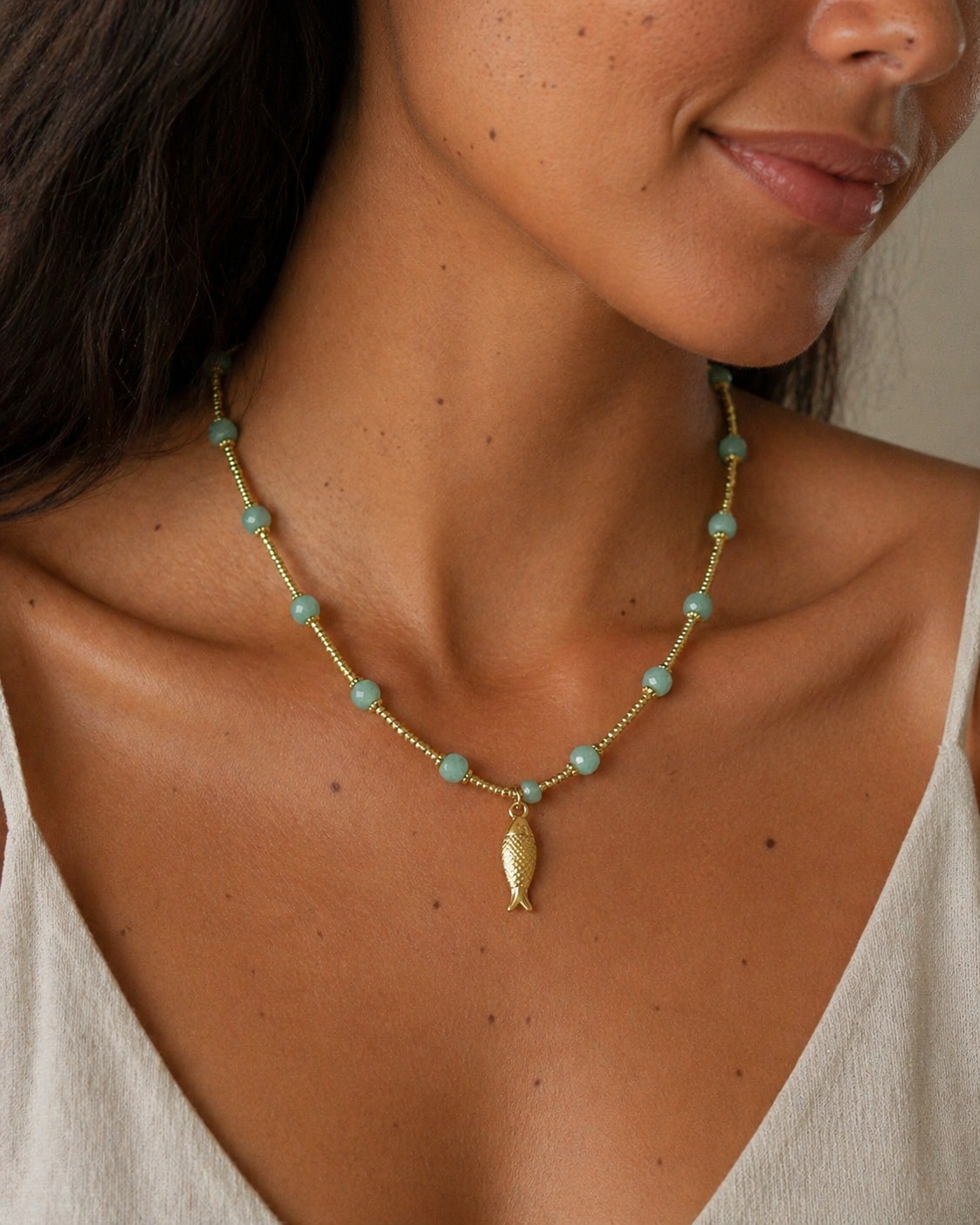 Collier poissons pierres précieuses
