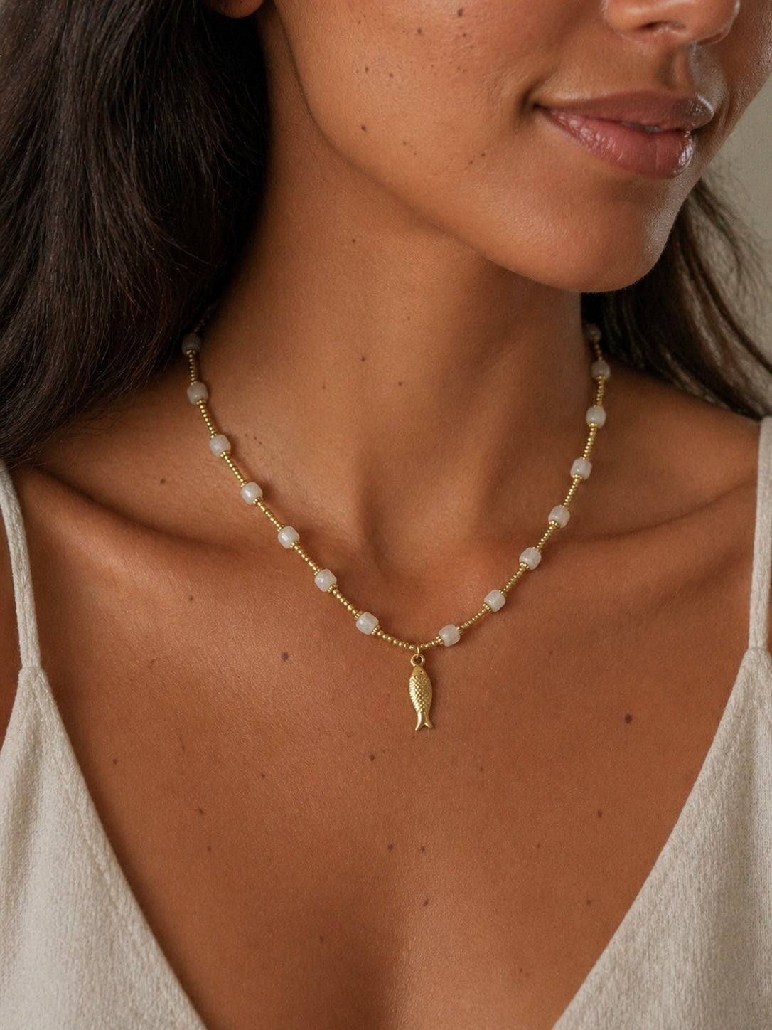 Collier poissons pierres précieuses
