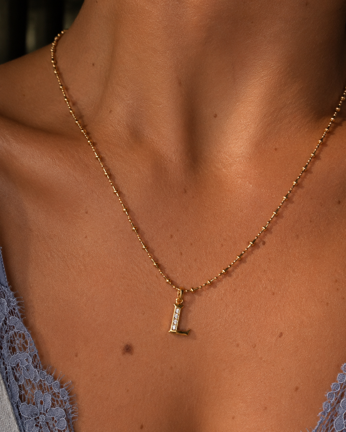 Pendentif initiale semi pavé